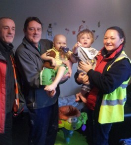 Dion (centre left) with his brother and members of the Community RePaint team